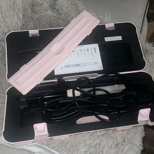 Gisou curling iron wand. Used twice.